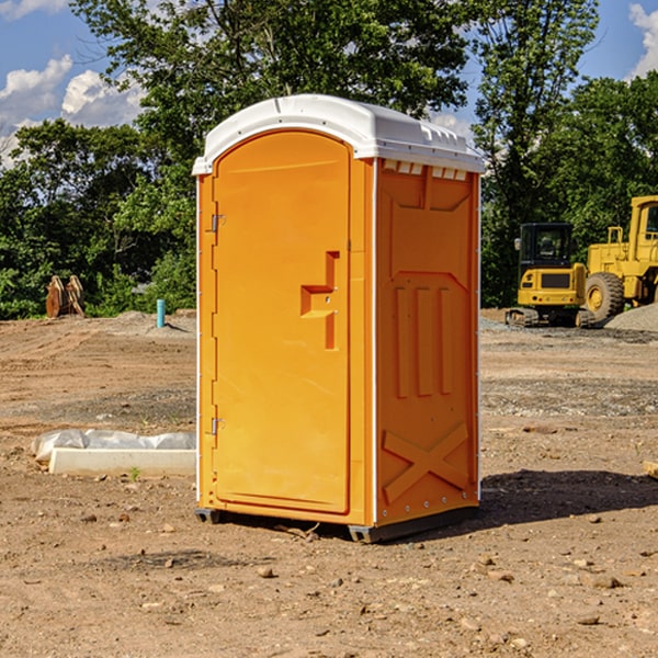 what is the cost difference between standard and deluxe portable toilet rentals in Harts